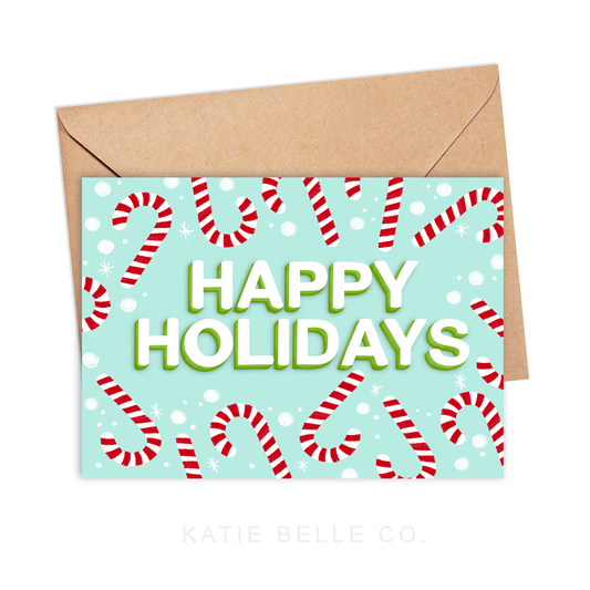 happy holidays. greeting card. christmas greeting card. holidays greeting card. candy cane card. candy canes. A2 size card. horizontal greeting card. hand drawn. red and white stripes. White block lettering. Snowflakes accents. Made by Katie Belle Co. 