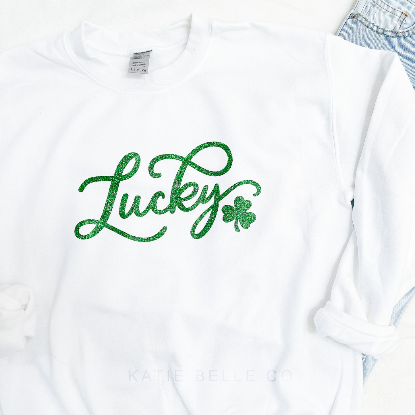 Lucky crewneck sweatshirt. St. Patrick's Day. Lucky Sweatshirt. Lucky Green sparkle. Four leaf clover. Katie Belle Co. 